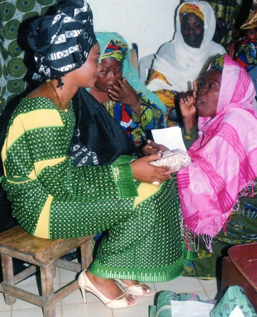 Sofia, left, is counseled by one of her aunts.