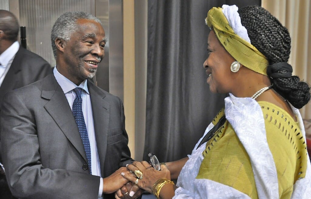 Former South African president Thabo Mbeki shakes hands with Ambassador Bennett