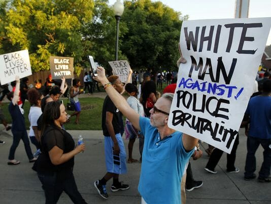 Demonstrators denounce police brutality after the incident.