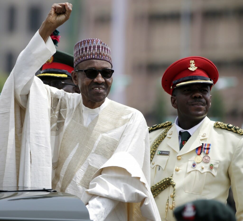 Nigerian President Muhammadu Buhari salutes the crowds during his inauguration on May 29, 2015 (AP Photo/Sunday Alamba)