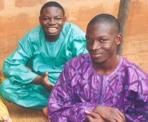 In this picture shot in 2004 are, from left to right: then-27-year-old grand-son Dahlil Salifou, now a senior civil engineer responsible for technical studies in a company in Abidjan, Côte d'Ivoire; Kader Salifou, then-15-year-old grand-son Kader Salifou, now a post-doctoral students in physics in a French university.