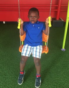 Great-grand-son Jean-Israel, 5, playing in his parents' yard in Abidjan, Côte d'Ivoire.