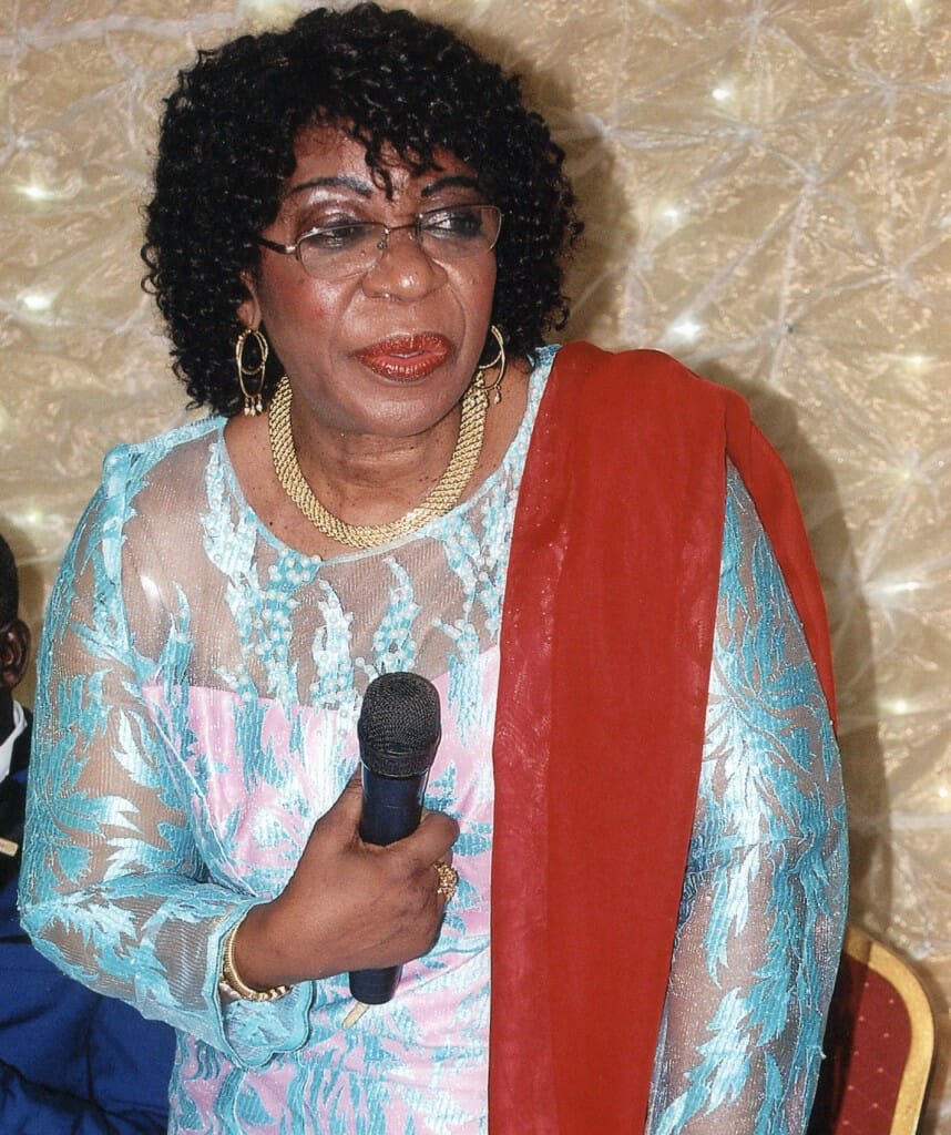 Inner Wheel Cotonou's president, Jeanne Godonou, addresses the Inner Wheel annual gala.