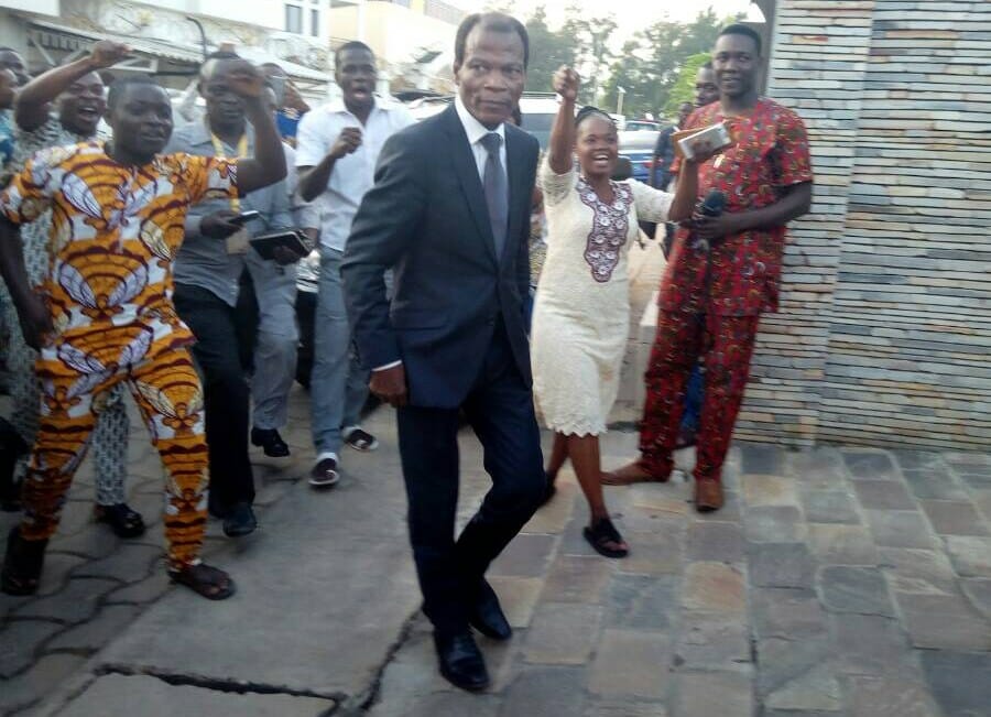 Former Defense minister, Candide Azannai, arrives at Lehady Soglo's residence on Friday.