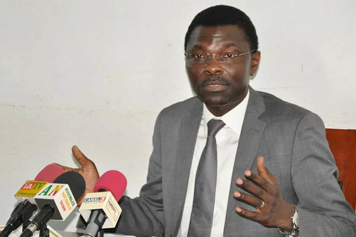 Benin Justice Minister, Joseph Djogbenou, holds a news conference
