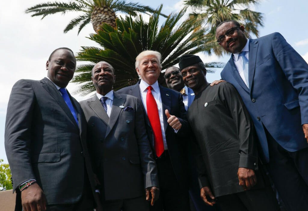 U.S. President Donald Trump (3rd from L) poses with (L-R) Kenya's President Uhuru Kenyatta, Guinea's President Alpha Conde, African Development Bank President Akinwumi Adesina, Vice-President of Nigeria Yemi Osinbajo and Ethiopian Prime Minister Hailemariam Desalegn for a photo after an expanded session at the Summit of the Heads of State and of Government of the G7 plus the European Union in Taormina, Sicily, on May 27.