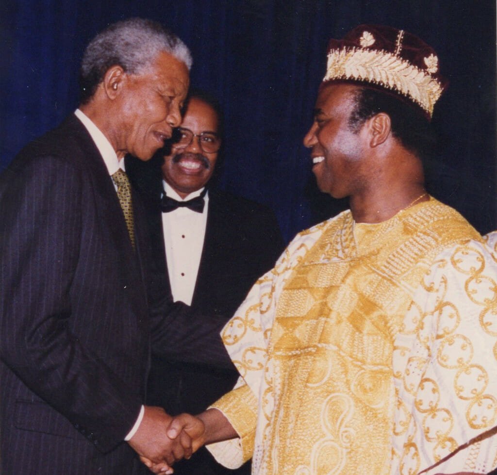 Then-President of South Africa, Nelson Mandela, shakes hands with then-president of Benin, Nicephore Soglo, at the Washington Sheraton on October 6, 1994 during a high-profile function in honor of Mandela.