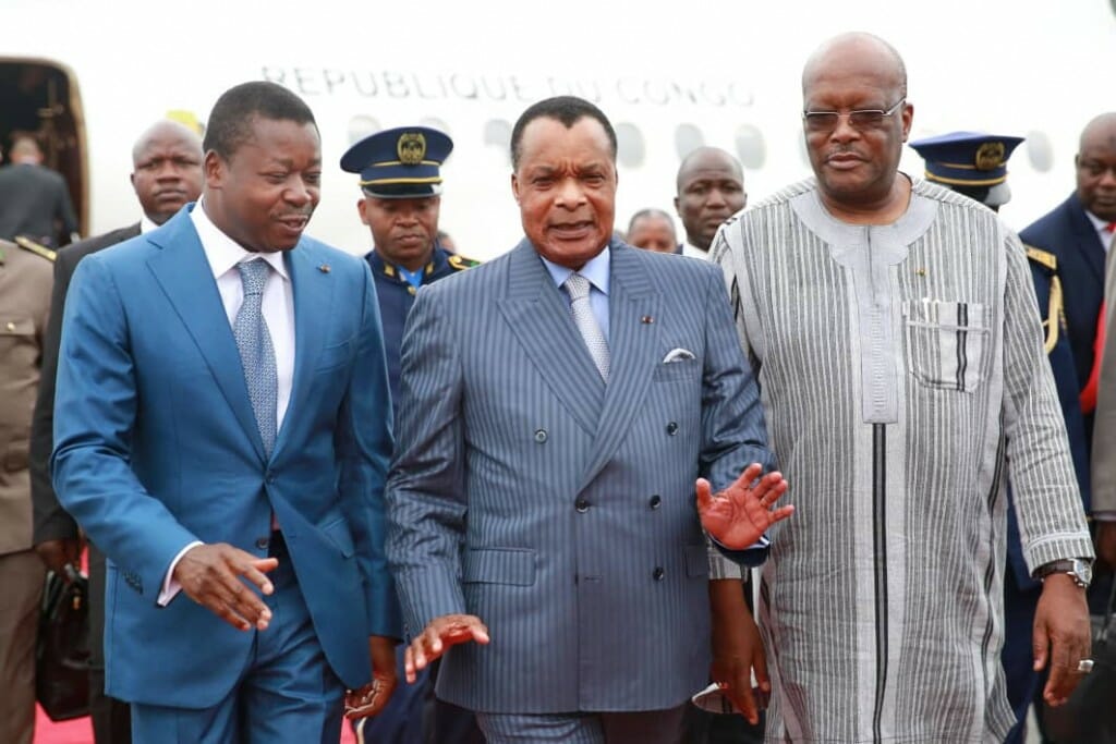 Togo's president Faure Gnassingbe, left with Congo's president Sassou Nguesso and Burkina Faso's president Roch Marc Christian Kabore