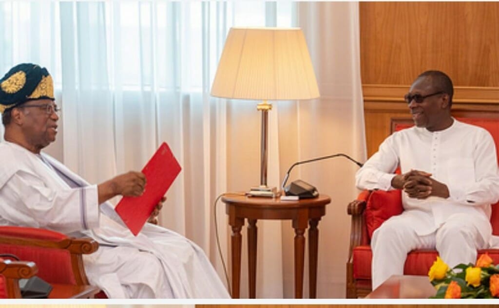President Patrice Talon, right, welcomes former president Nicephore Soglo at the presidential palace.