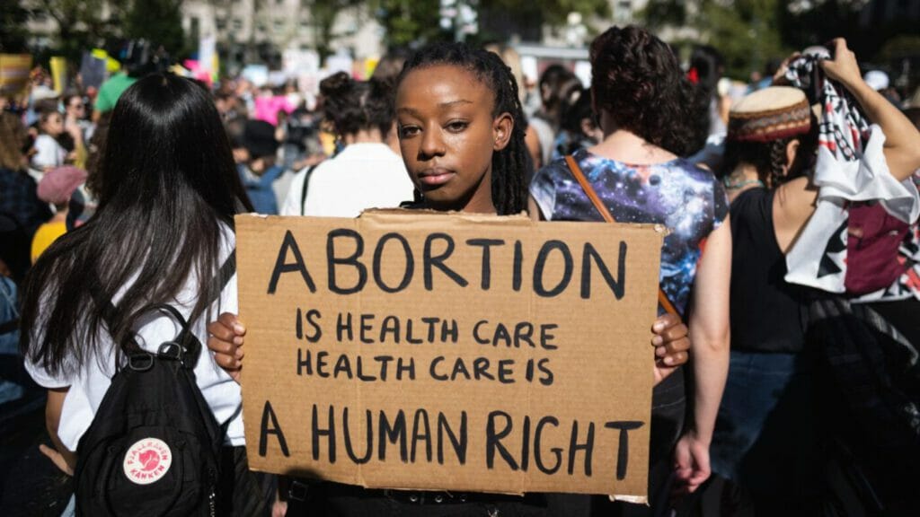 A demonstrator holds a pro-abortion sign