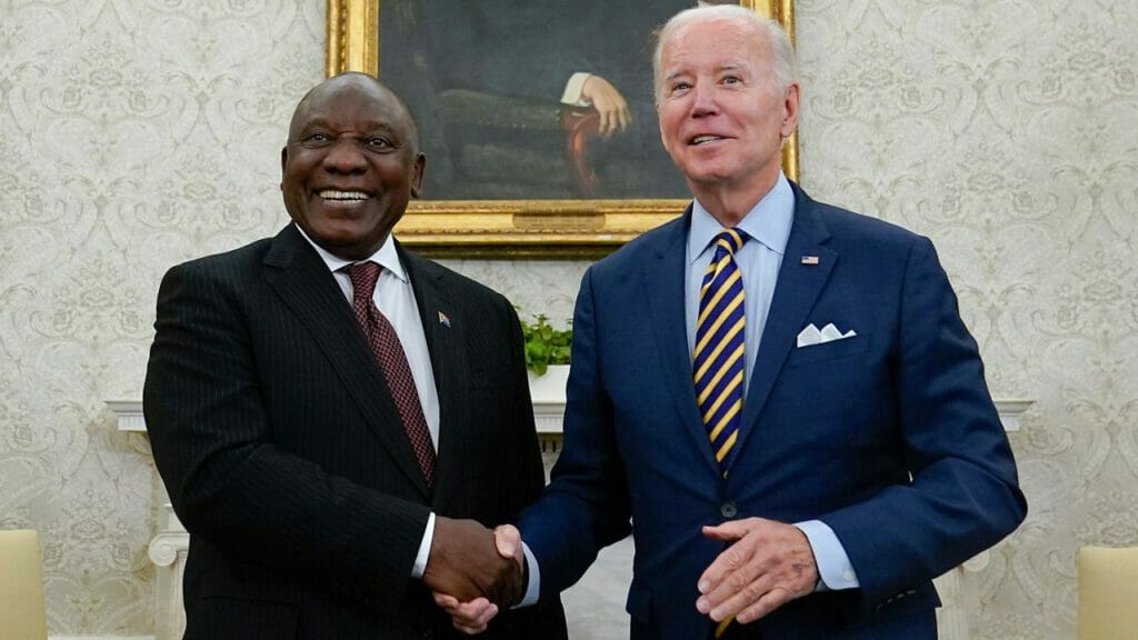 South Africa's president Cyril Ramaphosa shakes hands with President Biden at the House on Friday