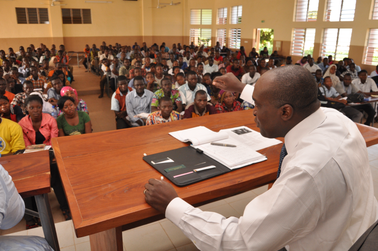 Ambassador Omar Arouna in 2013 at the University of Parakou, in Northern Benin, providing an entrepreneurial course to students at the University as part of his give-back program.