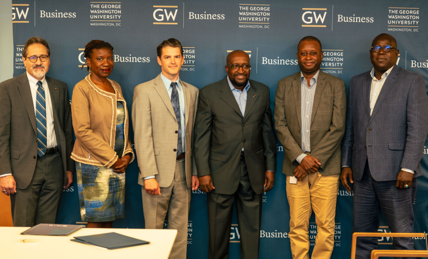 Official photo at the signing of the partnership between The George Washington University School of Business (GWUSB) and the Center for Cyber Diplomacy and Leadership (CCDL).