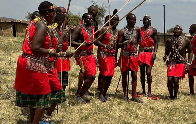 Maasai men performing a traditional Maasai song