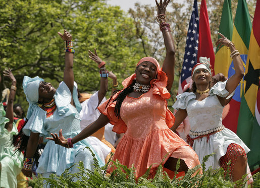 The KanKouran West African Dance Company performs in the Rose Garden at the White House on April 25, 2007, at the invitation of President George W. Bush during a ceremony marking Malaria Awareness Day. Image by White House photographer Eric Draper.