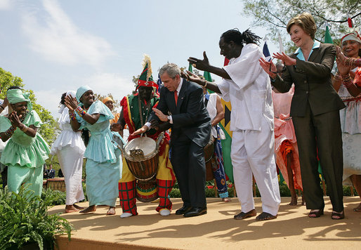 President Bush beats the djembe. Image by White House photographer Eric Draper.