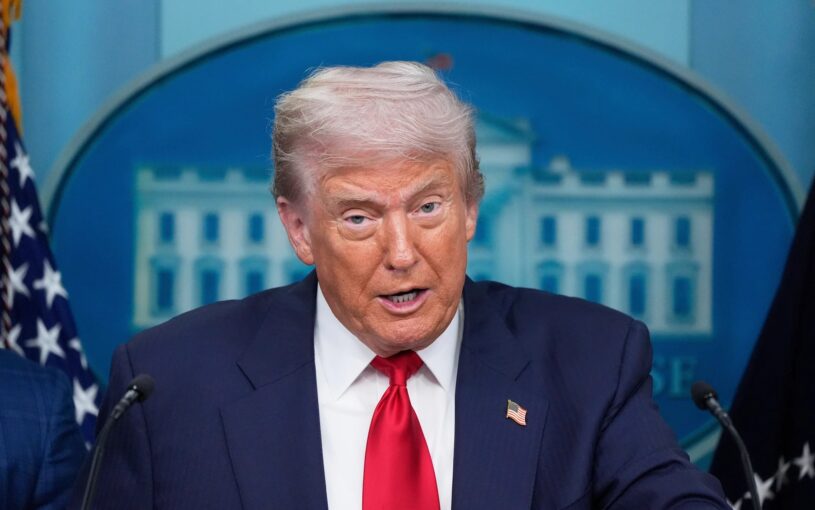 President Donald Trump discusses the federal takeover of the Washington, D.C.'s police department with reporters at the White House on Monday, August 11. Image courtesy Getty Images. 