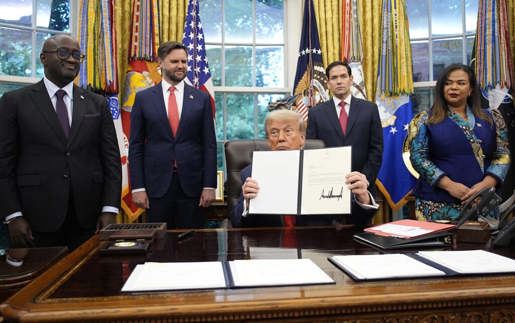 The signing ceremony of the June 27th accord at the White House.
